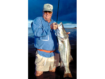 Walter Fondren III, one of CCA's founders, was a huge fan of fishing on the Texas coast. Here he holds a large snook in 1998. Photo by CCA.
