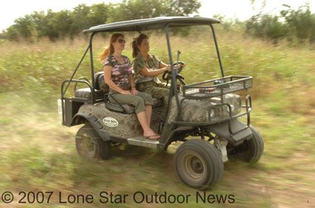 Jacquelyn Brown and Ronel Bronson test drive the 2008 Bad Boy Buggy on the Hacienda Ranch near Uvalde. Photo by David J. Sams