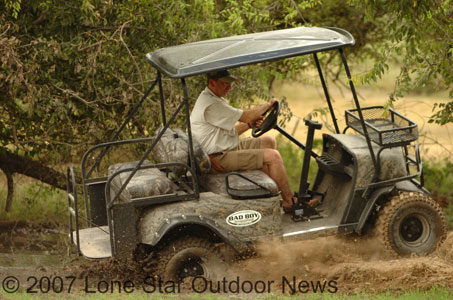 Mark Brown negotiates a muddy spot on his Hacienda Ranch. Photo by David J. Sams