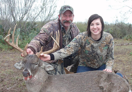 Top score: Larry Leschper and his daughter, Kristina, pose with the 195-pound buck she harvested that scored 148 4/8.
